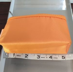 Clinique orange carry all pouch brand new without tags